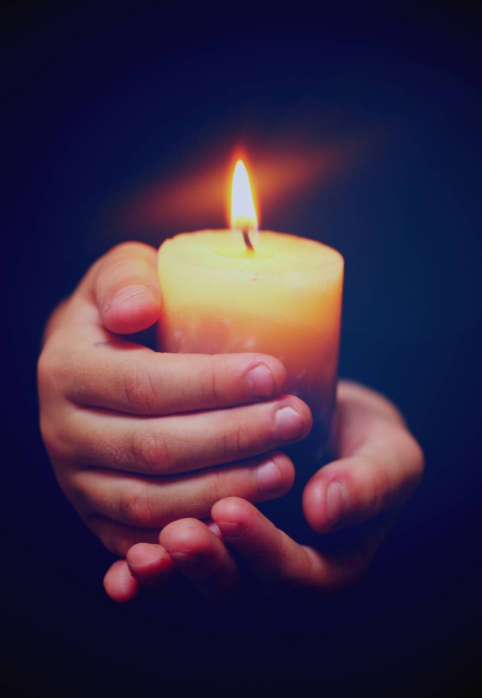 candle in hands candle in hands